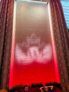 An animated version of the WordCamp Canada logo projected on the wall of the conference centre foyer.