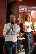 Ilias Benjelloun gives some opening remarks at the EvolveDigital summit in Montreal on August 4, 2025.