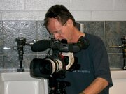 Bryon Hunter sets up his camera before shooting